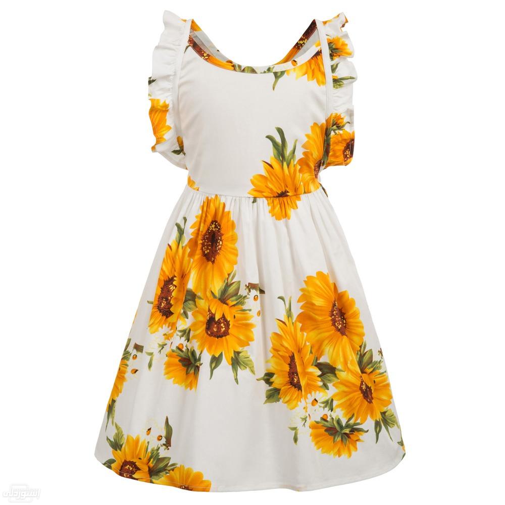 فستان قطن بدون أكمام ذات أشكال ورسومات مبهره ومكشوف من الخلف ذات جودة عالية ابيض به ازهار صفراء 