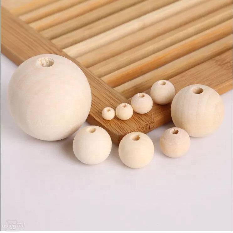 خرز من الخشب باحجام مختلفة متعدد الاستخدامات ذو لون خشبي نوعية رفيعة 